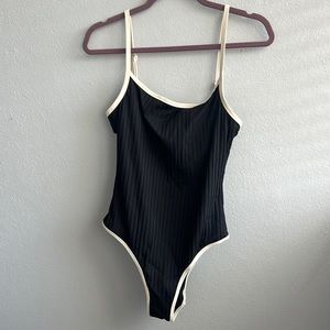 Black and white one piece bathing suit